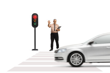 Poster - Full length portrait of a security guard gesturing stop with hand at a pedestrian crossing