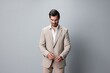 © SHOTPRIME STUDIO - man happy smiling beige suit businessman handsome crossed portrait business copyspace