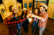 © kleberpicui - Festa Junina in Brazil. Group of friends toasting during the Festa Junina.