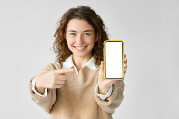 young happy woman model pointing at big mobile phone screen presenting new trendy app at cell, showi