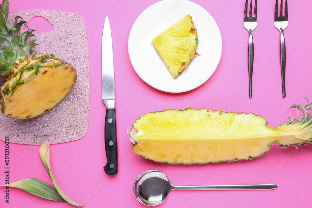 Composition with fresh ripe pineapple, board and cutlery on pink background