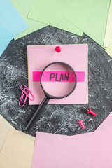 Wall Mural - top view plan written note with magnifier on gray background student paper college lesson pen study 