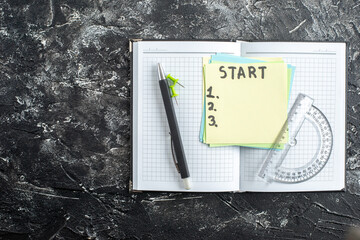 Wall Mural - top view start note with copybook and pen on gray background study paper school lesson student note 