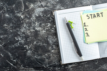 Wall Mural - top view start note with copybook and pen on gray background study paper school lesson student note 