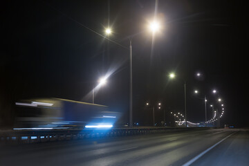 Wall Mural - truck traffic on a winter highway