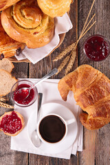 Wall Mural - french food- breakfast with coffee cup, jam and croissant