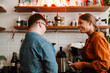 © Drobot Dean - Woman training man with down syndrome to work as barista in coffee shop