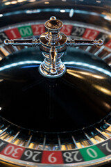 Wall Mural - lucky gambling casino close up, Close up view of roulette wheel with the ball.Gambling wheel in casino