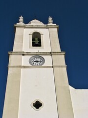 Church tower in Sao Martinho with blue sky, Centro - Portugal 