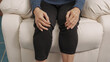 © M+Isolation+Photo - knee pain, Asian mature woman close up mature old woman touching knee joint, having painful feelings.