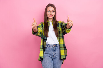 Sticker - Photo of gorgeous cheerful woman with long hairstyle wear checkered shirt showing thumbs up good job isolated on pink color background