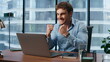 © stockbusters - Young businessman rejoicing profit growth closeup. Man gesturing yes alone