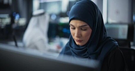 Poster - Portrait of a Smart Focused Middle Eastern Engineer Working on Computer in a Technological Corporate Office. Young Arab Woman in Hijab Developing Software for an Innovative Internet Service Provider