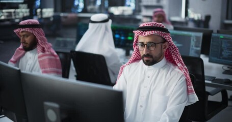 Diverse Middle Eastern Software Development Department Working on an Artificial Intelligence Tool by Optimizing Language Models. Group of Web Engineers Create an AI with Reinforced Learning Techniques