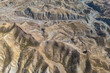 © ADDICTIVE STOCK - Drone view of rough rocky mountains with dry river in daylight