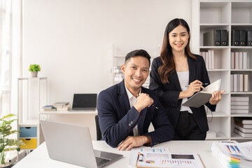 Wall Mural - Business women and man working in the office