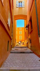 Wall Mural - street in the colorful old town of Saint Tropez in the south of France