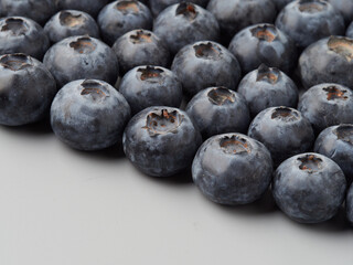 Wall Mural - Fresh organic blueberries in a bowl closeup view