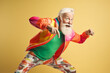 © Mihai Zaharia - Funny old man doing gymnastics or aerobics. Generative AI