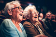 Two old ladies friends watching a movie together in the cinema and having fun. Generative AI