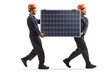© Ljupco Smokovski - Factory workers carrying a solar panel and walking