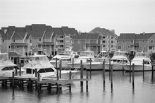 Boats In Harbor Near Houses, Cape Hatteras, North Carolina, USA