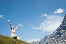 Woman With Raised Arms, Bernese Oberland, Switzerland