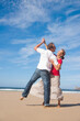 © Designpics - Couple Dancing on the Beach, Camaret-sur-Mer, Crozon Peninsula, Finistere, Brittany, France