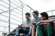 © Designpics - Boys with Tablet Sitting on Bleachers, Mannheim, Baden-Wurttemberg, Germany