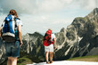© Designpics - Backview of mature couple hiking in mountains, Tannheim Valley, Austria
