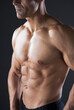 © Designpics - Close-up of Muscular Man's Chest, Studio Shot