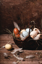Basket Of Multicoloured Easter Eggs