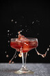 © The Picture Pantry - A splash in a cocktail glass with copy space