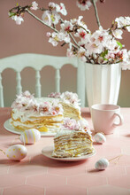 Crepe Cake Or Blini Cake For Easter Party, Rose Pink Background, Almond Flowers