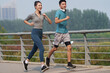 © View Stock - Young couples in the outdoor running