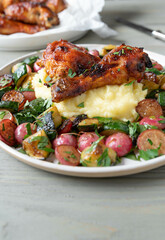 Wall Mural - Chicken with roasted vegetables and mashed potatoes on a plate