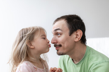 Wall Mural - father and toddler daughter cheerful portreit, tenderness family relationship. . Fathers day 