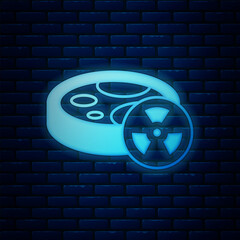 Wall Mural - Glowing neon Laboratory chemical beaker with toxic liquid icon isolated on brick wall background. Biohazard symbol. Dangerous symbol with radiation icon. Vector