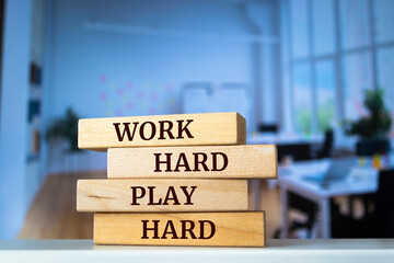 Wall Mural - Wooden blocks with words 'WORK HARD PLAY HARD'.