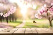 Kirschblüten - leehre Holzplatte im Vordergrund für Produktanzeige, frühlingsnatur unscharfer hintergrund