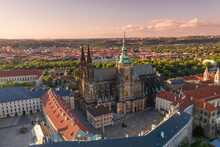 Sunset in Prague Old Town with St. Vitus Cathedral and Prague castle complex with buildings revealing architecture from Roman style to Gothic 20th century. Prague, capital city of the Czech Republic
