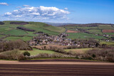 Fototapeta Desenie - View towards Chideock village in Dorset county  from the path leading to the Golden Cap.