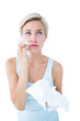 Crying pretty woman holding tissues 