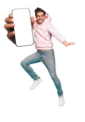Wall Mural - mobile app advertisement. handsome excited man showing pointing at empty smartphone screen posing ov
