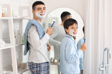 Poster - Morning of father and his little son shaving in bathroom