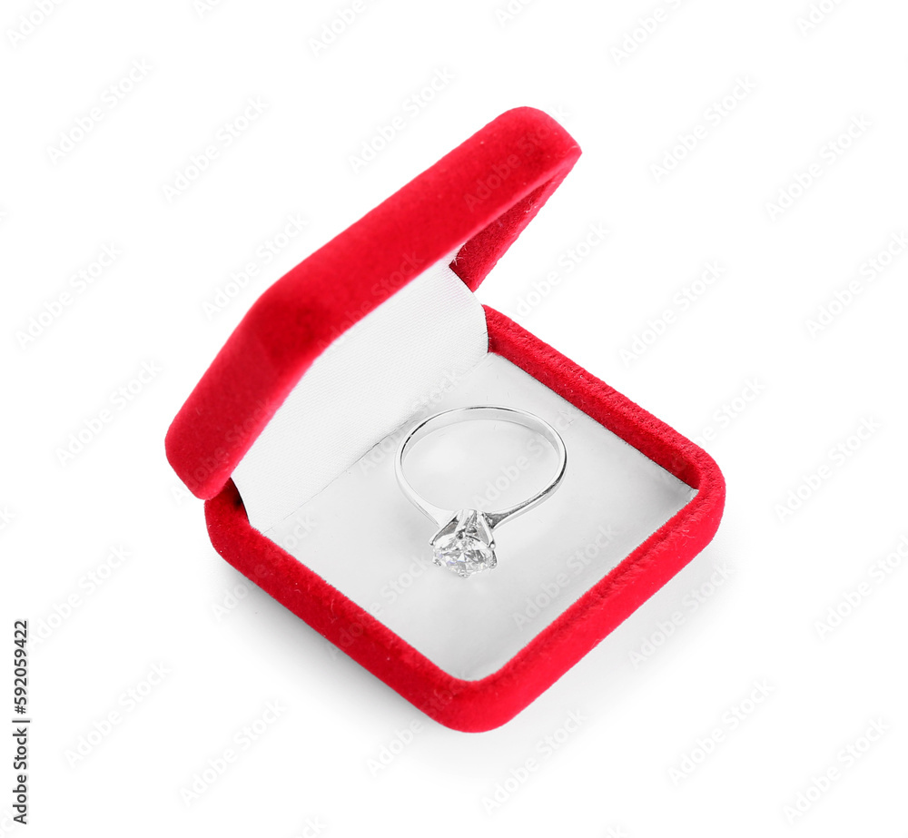 Red box with engagement ring on white background