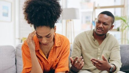 Wall Mural - Black couple, divorce and conflict in argument, breakup or fight in living room dispute on sofa at home. Upset and angry African man and woman in toxic relationship, disagreement issues or fighting