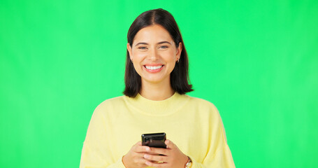 Canvas Print - Smile, woman and smartphone on green screen, face and studio for social media, online contact and meme. Portrait of happy female model typing on cellphone, download mobile games or scroll for texting