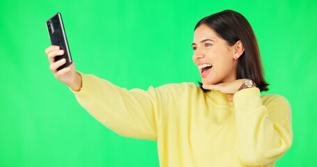 Poster - Happy woman, face and selfie on green screen with peace sign and facial expressions against studio background. Silly or goofy female model smiling for photo, emoji or memory with smartphone on mockup