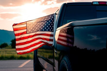 4th July, An American Flag Is Unfurled By A Patriot In The Window Of His Truck